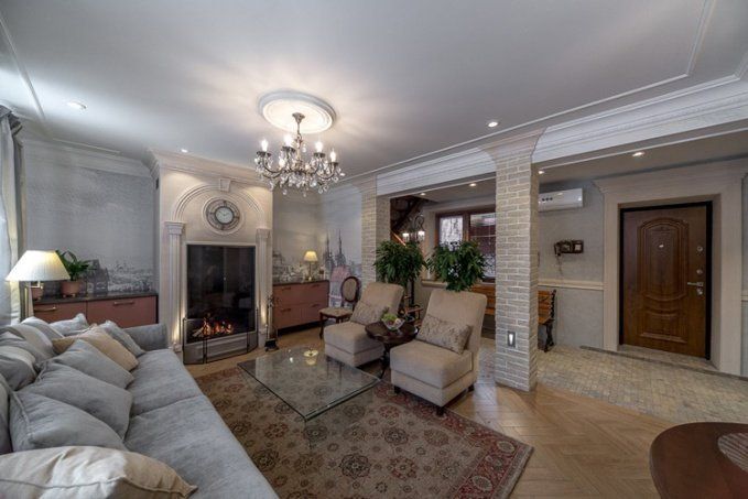 лепнина из полиуретана ORAC DECOR в интерьере гостиной